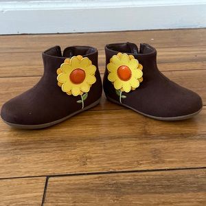 Brown low cut boots with beautiful yellow flower on the sides